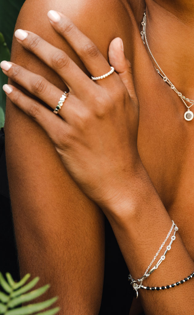 silver jewellery with silver stacking rings and silver bracelets